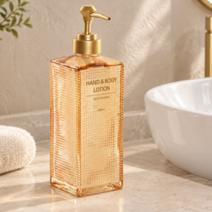 Dosificador ámbar con relieve y dispensador dorado · 400 ml